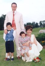 Daddy, Kate, Nicolas and Katie at Country Club Size300.jpg (27698 bytes)